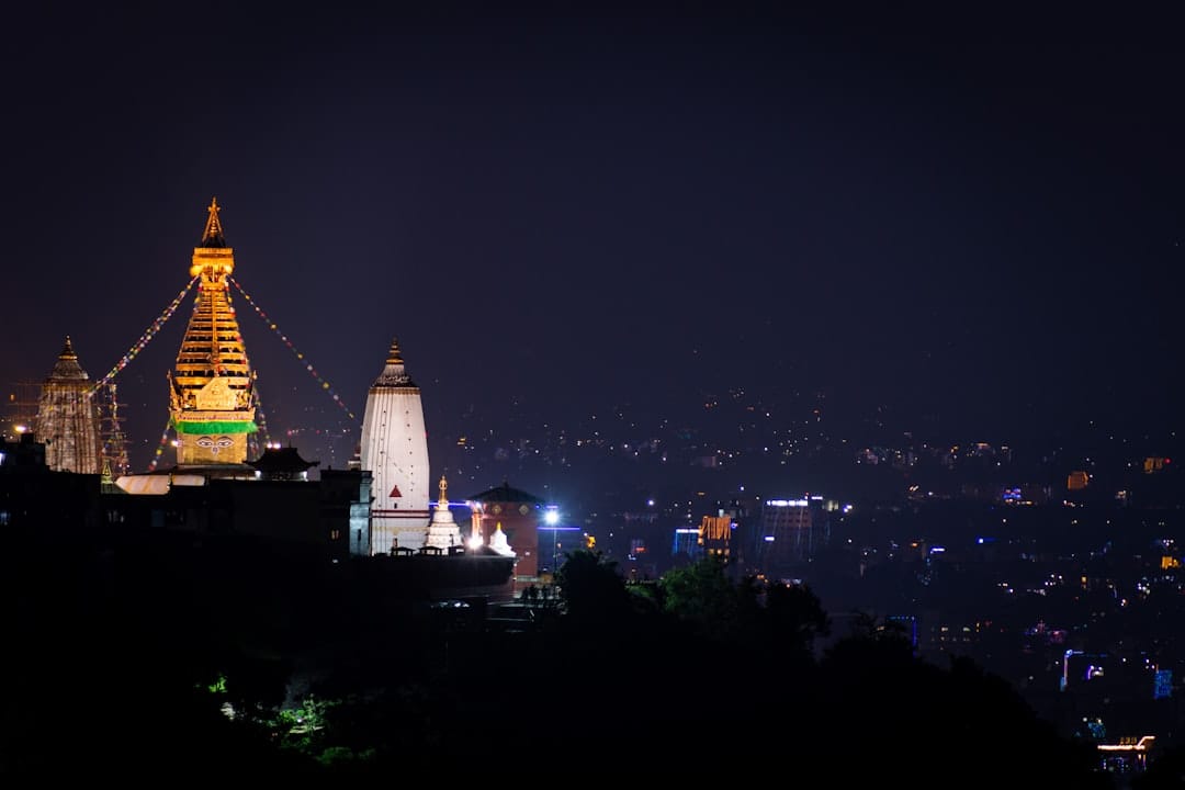 The Swayambhunath stupa with its painted Buddha eyes above the Kathmandu Valley