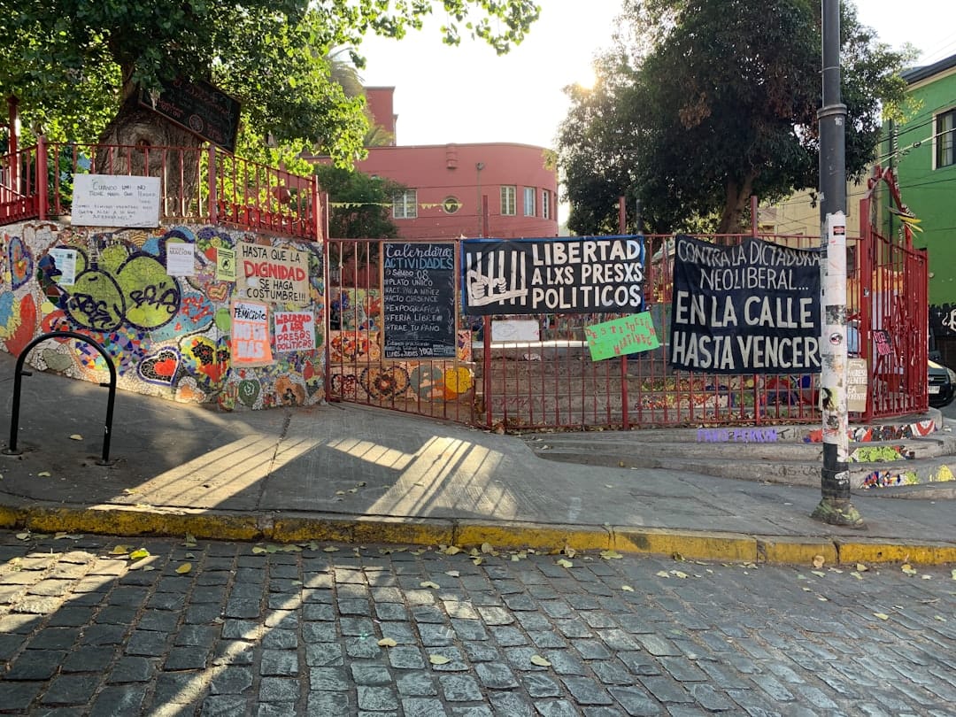Street art and murals covering a wall in Valparaíso