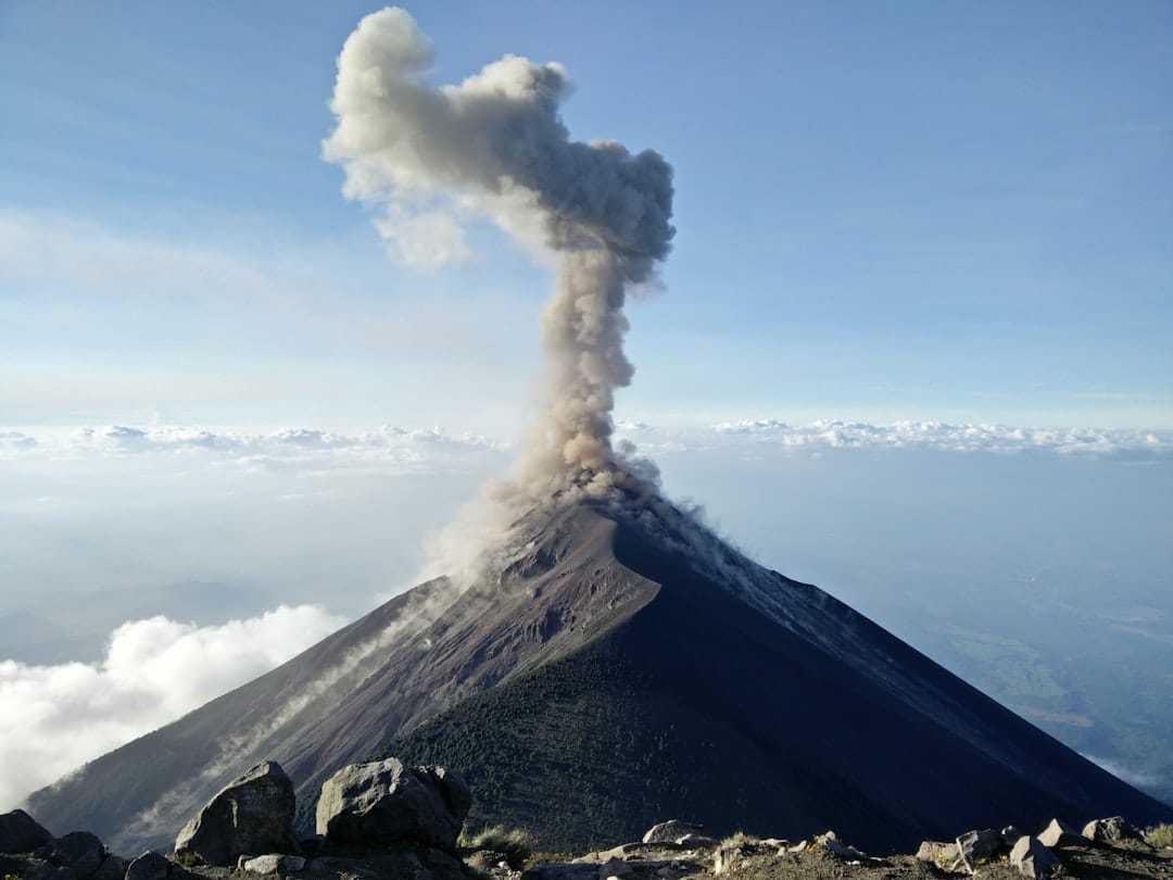 Base camp on Acatenango with Fuego volcano erupting