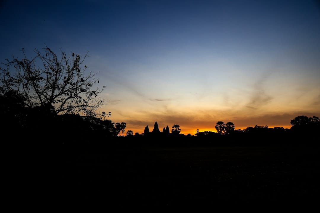 Angkor Wat towers reflected at dawn