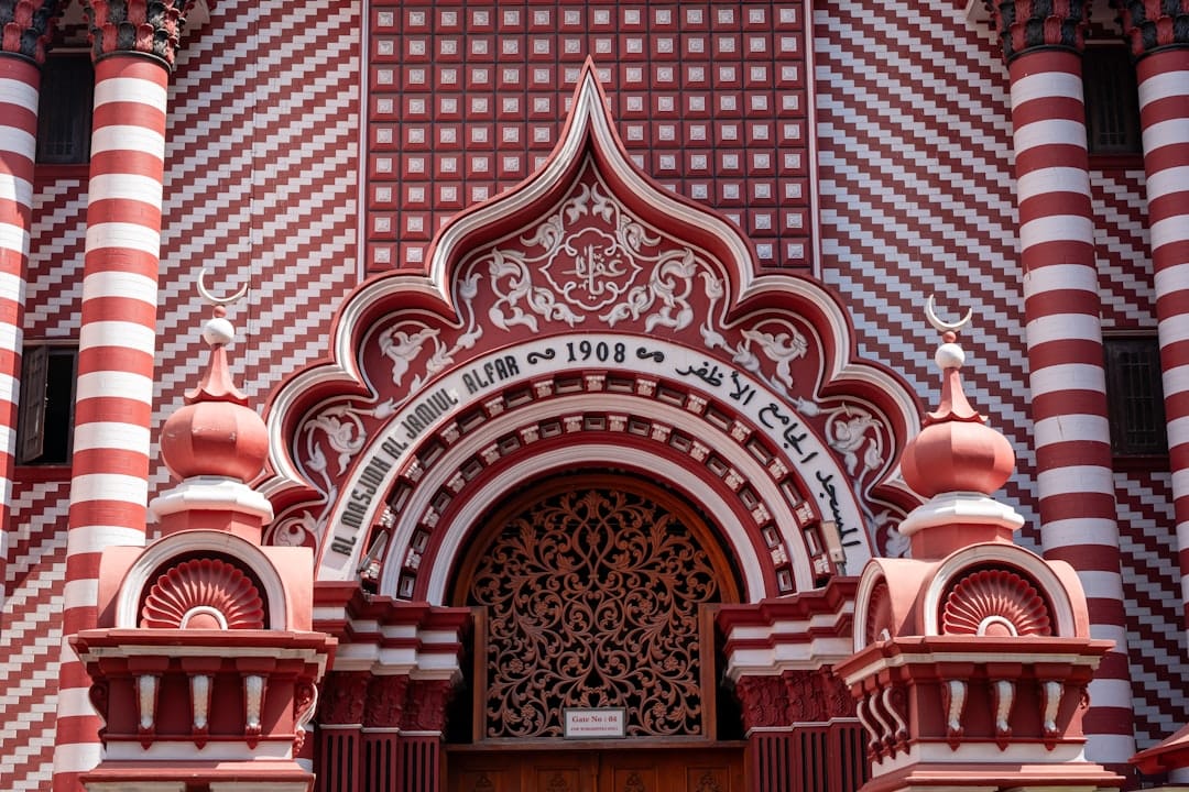 The red-and-white striped facade of the Jami Ul-Alfar Red Mosque in Pettah