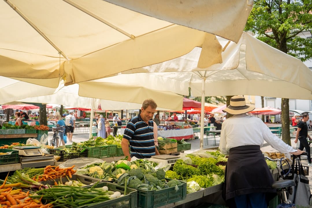 Vendors and produce stalls at Ljubljana's open-air Central Market