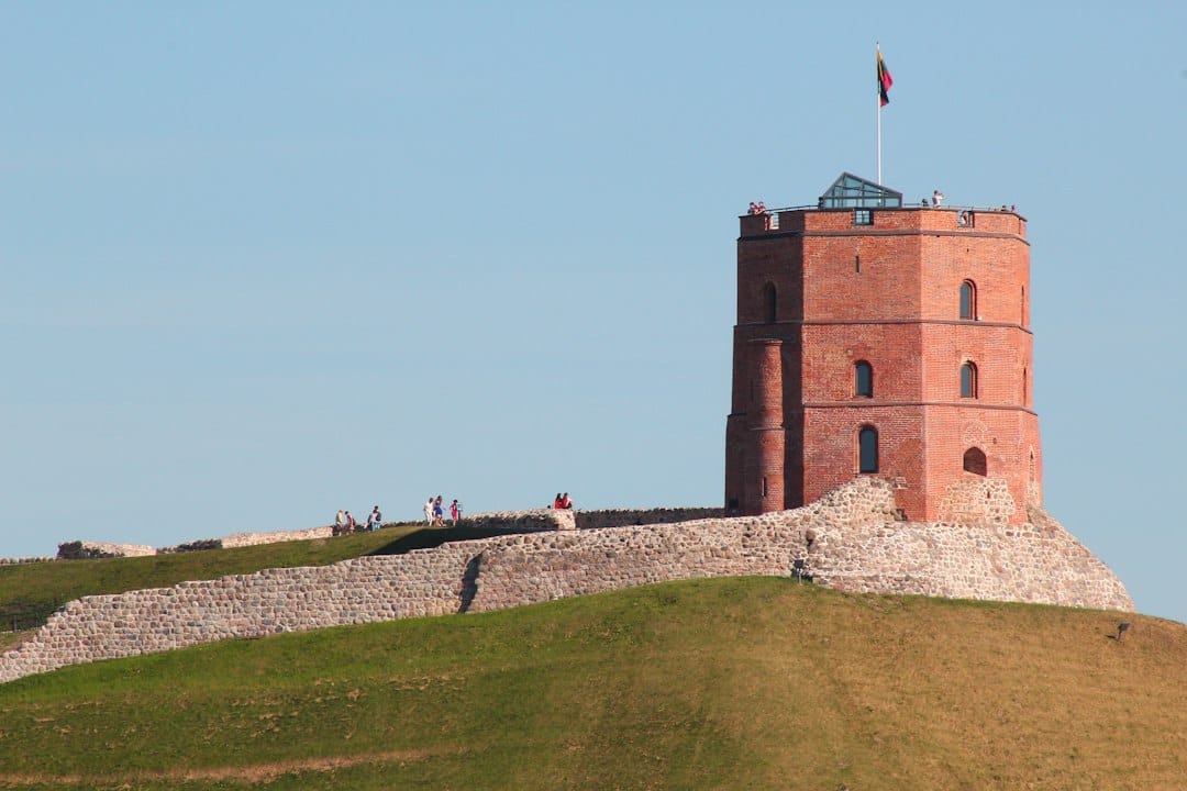 Gediminas' Tower on Castle Hill above Vilnius Old Town, Lithuanian flag flying