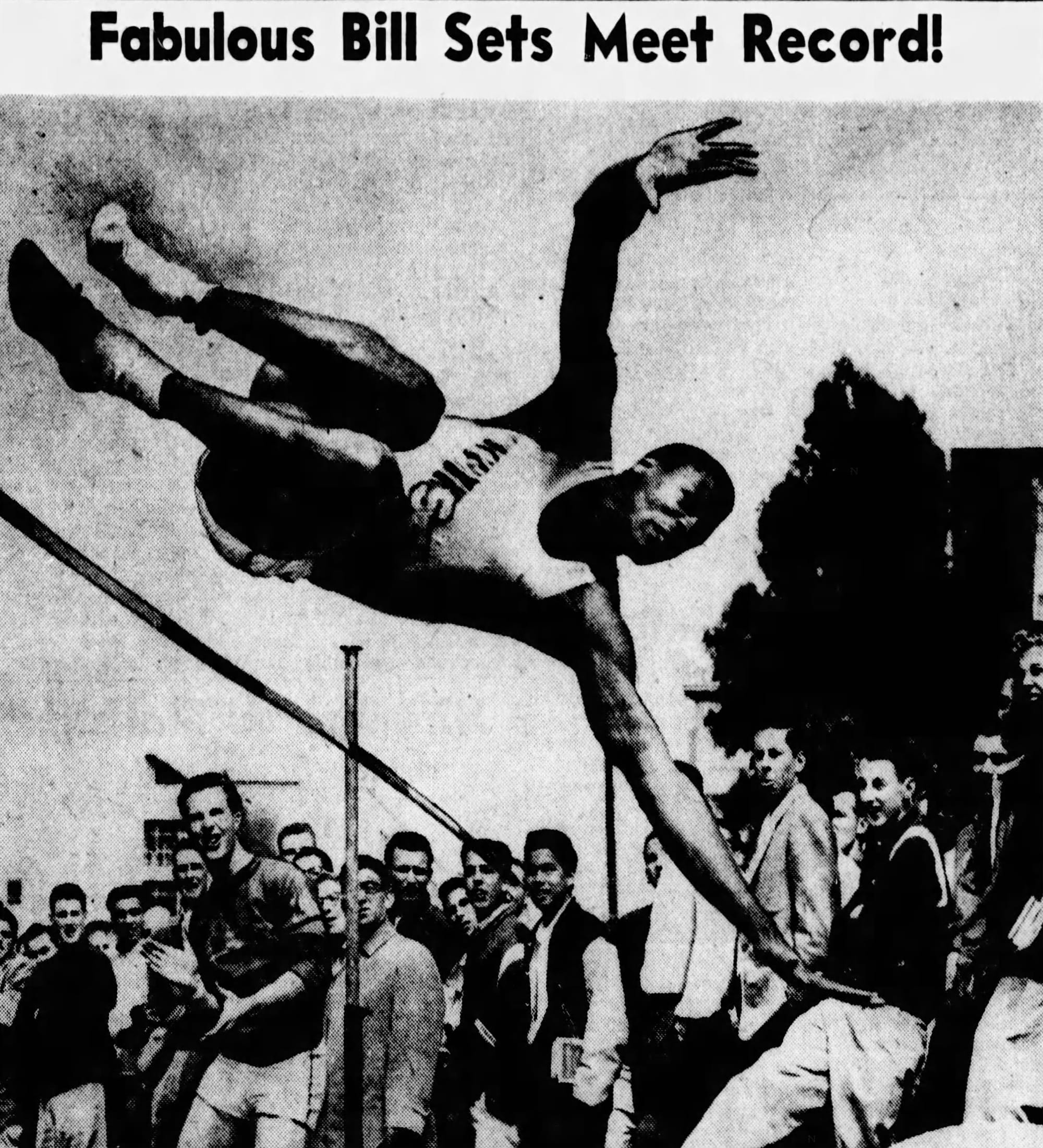 Bill Russell en plein effort qui bat le record de saut en hauteur de l'université de San Francisco. 
