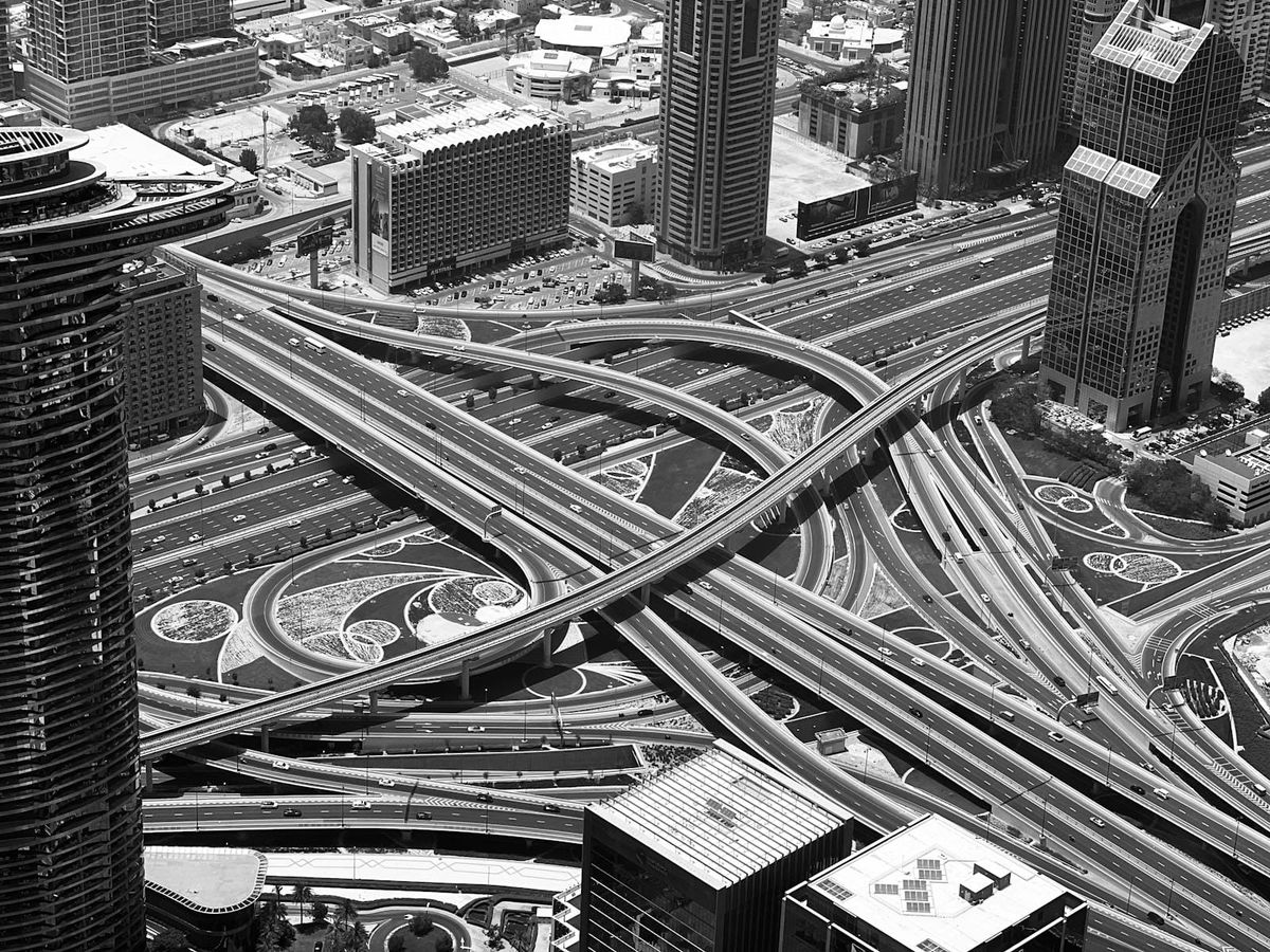 An aerial view of Sheikh Zayed Road and the Dubai skyline, generic Dubai driving illustration