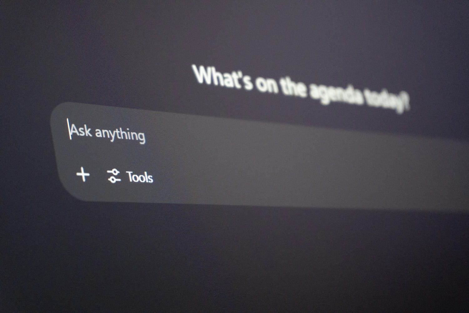 A chatbot prompt box on a dark screen reading Ask anything.