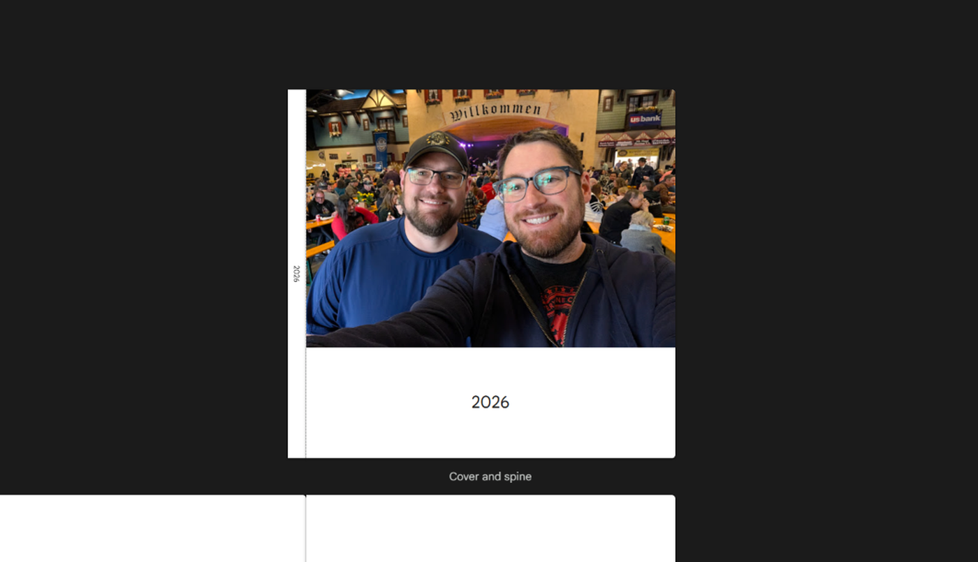 The Google Photos book editor showing a cover photo and the title 2026.