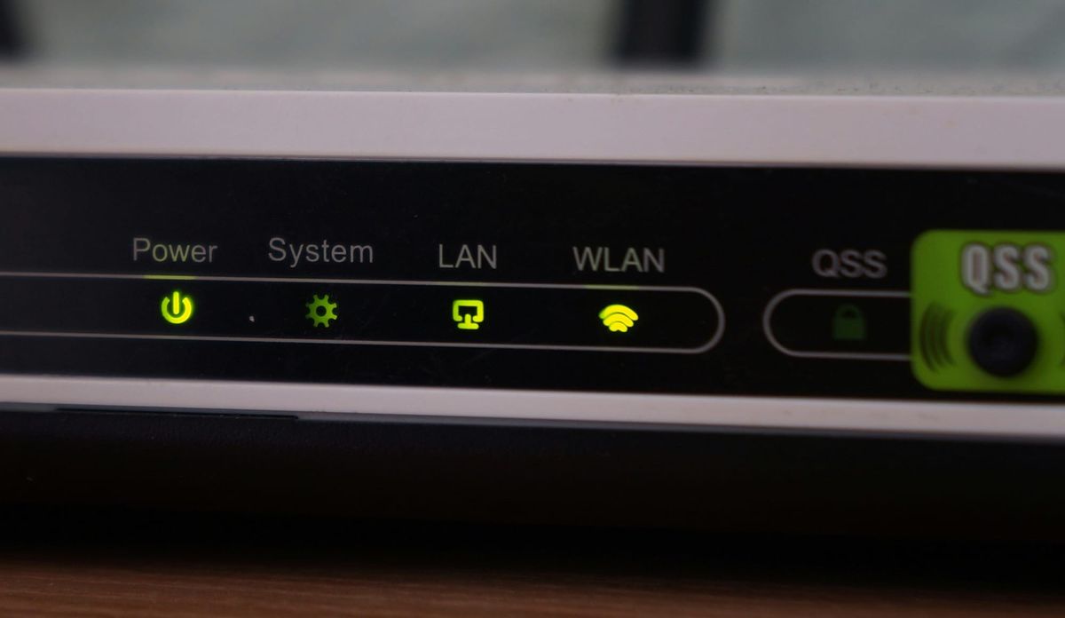 A home Wi-Fi router on a windowsill