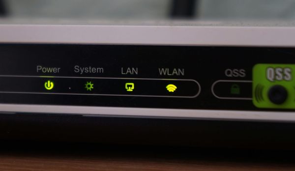 A home Wi-Fi router on a windowsill
