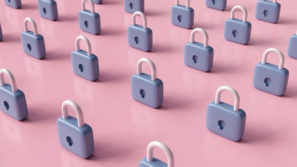 A grid of identical blue padlocks on a soft pink background.