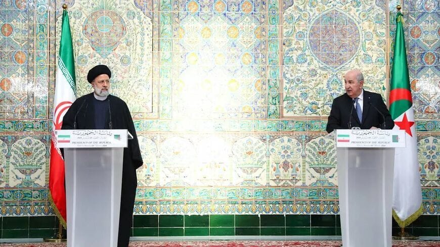 Iranian President Ebrahim Raisi (L) with Algerian President Abdelmadjid Tebboune. Photo: Iranian Presidency