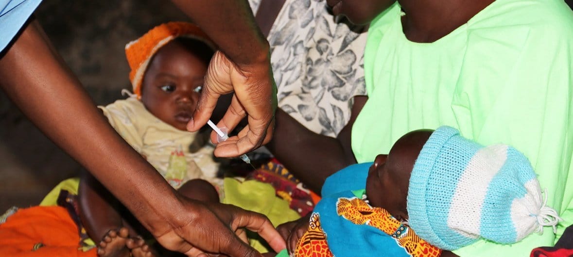 A five-month old child at Mkaka in Malawi receives a malaria vaccine. Photo: UN