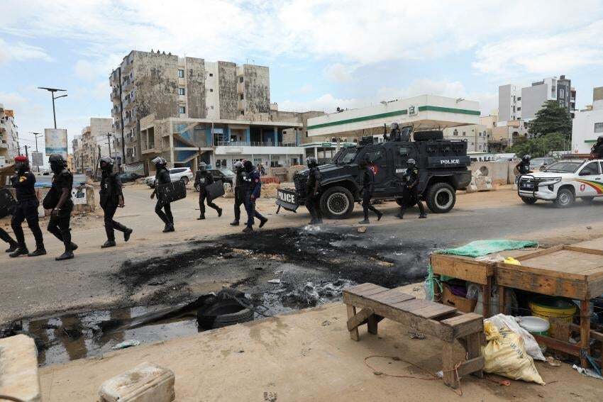 Gendarmes deployed to calm protests after opposition leader Ousmane Sonko was detained. Photo: Ngouda Dione/Reuters