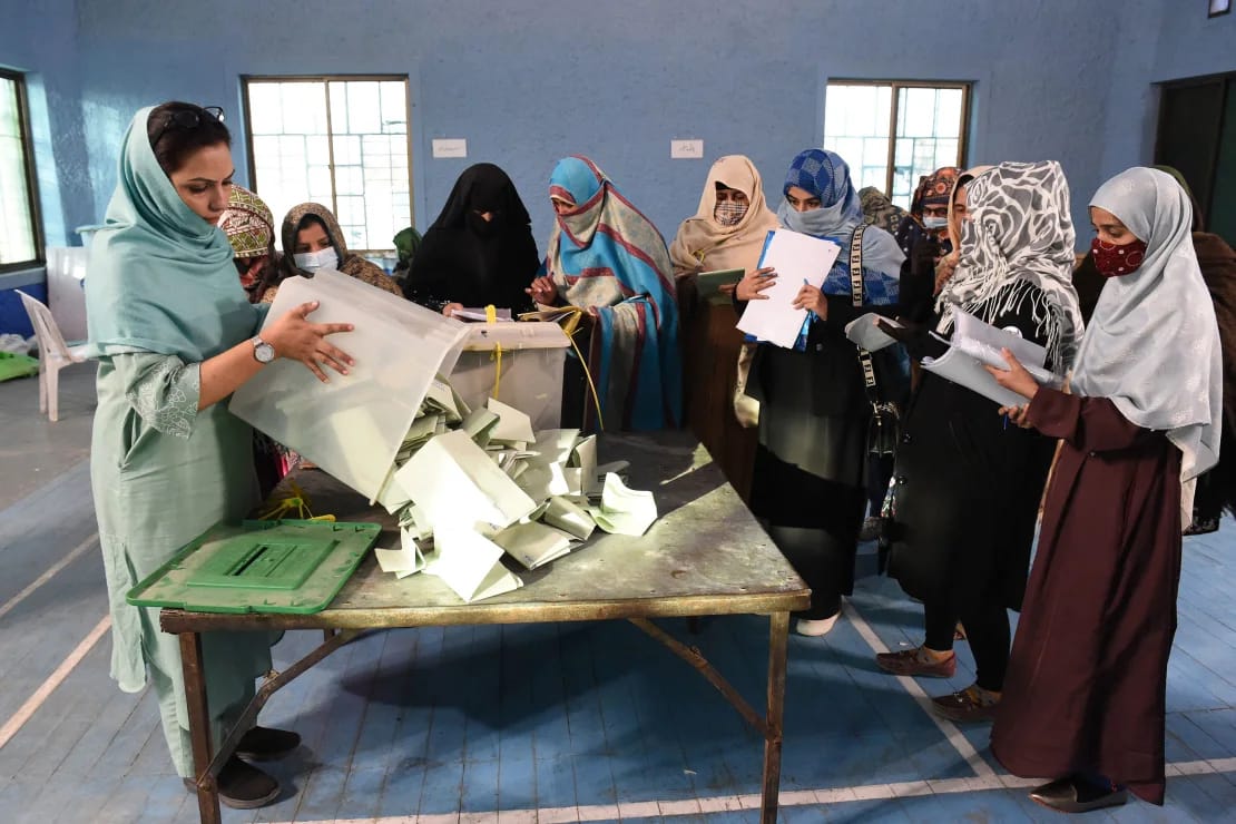 Polling staff open ballot boxes in Quetta, Pakistan. Photo: Banaras Khan/AFP/Getty Images