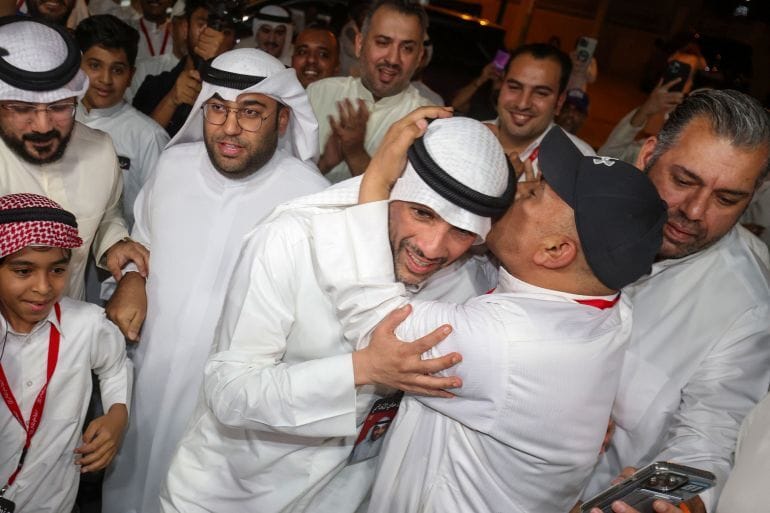 Former parliament speaker Marzouq al-Ghanim, center, greets supporters after his election as a member of Kuwait’s parliament. Photo: Yasser Al-Zayyat/AFP