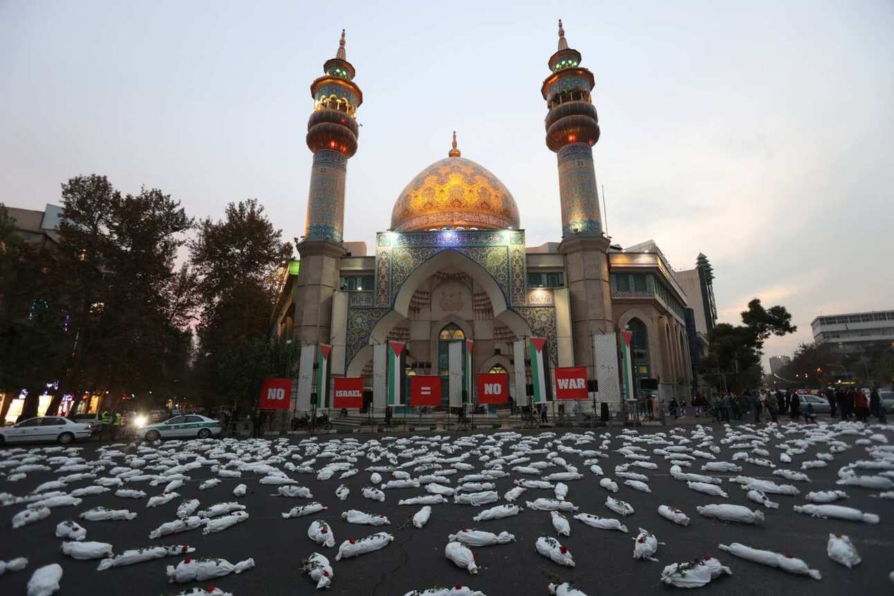 Shrouds in Tehran symbolize the children who have died in Gaza: Iran is warning that ongoing war in Gaza could result in wider conflict. Photo: Majid Asgaripour/WANA/Reuters