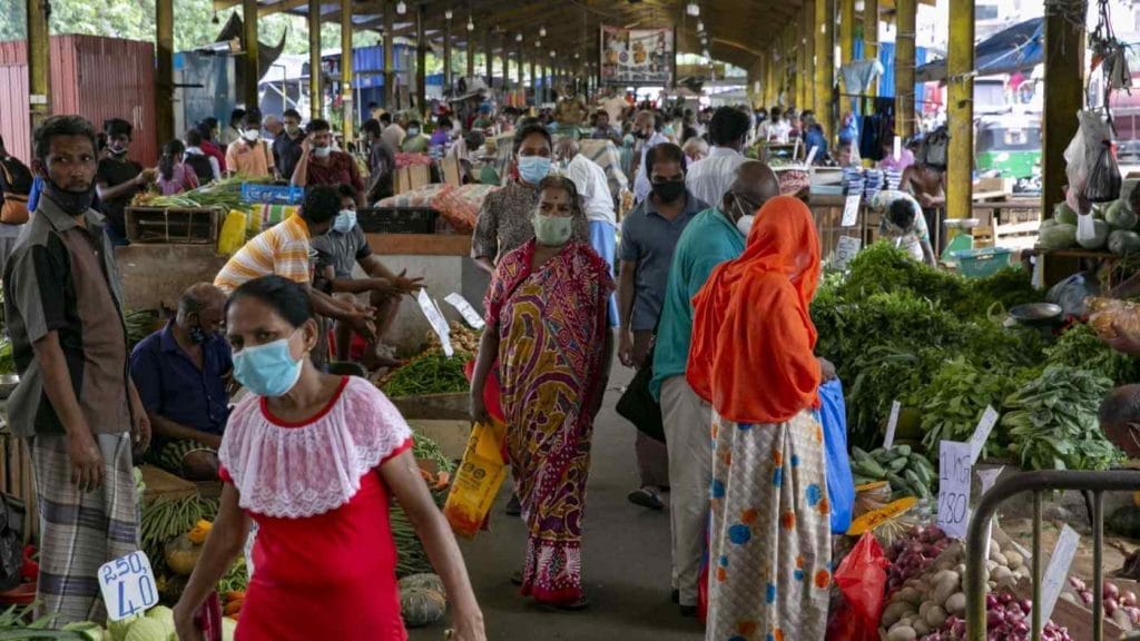 Shoppers in Colombo, Sri Lanka. Emerging markets assets have suffered record outflows this year. Photo: Allison Joyce/Bloomberg
