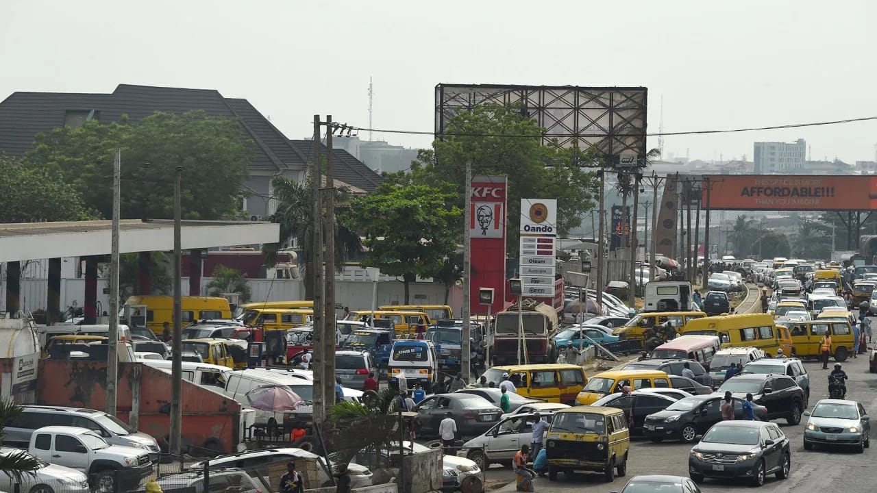 Drivers queued at gas stations in May in Nigeria after Tinubu announced a controversial fuel subsidy was ‘gone.’ Photo: Pius Utomi Ekpei/AFP/Getty Images