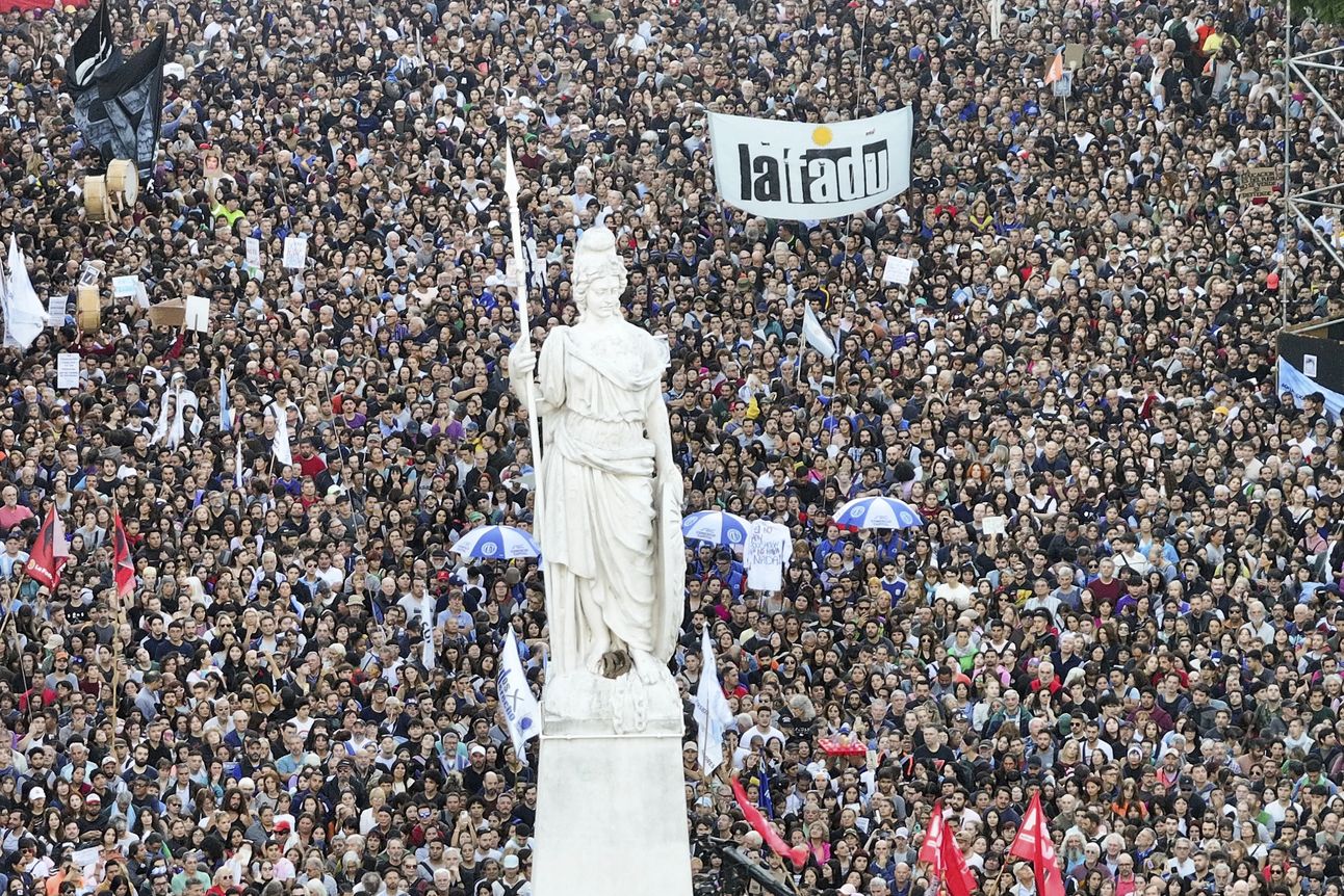 Demonstrators outside the Casa Rosada presidential palace in Buenos Aires this week. Photo: Rodrigo Abd/AP