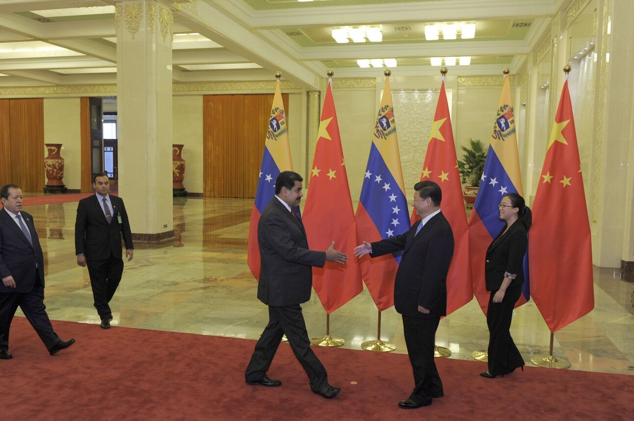 Nicolas Maduro, center left, with Xi Jinping in Beijing. Photo: Parker Song-Pool/Getty Images