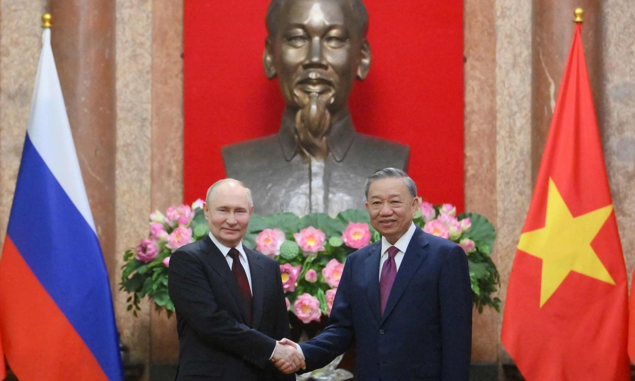 Putin with Vietnamese president To Lam in Hanoi. Photo: Kristina Kormilitsyna/Reuters