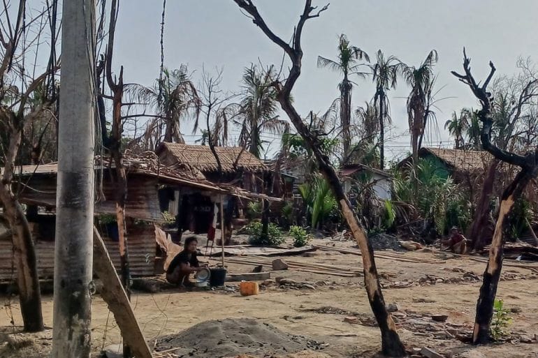 A May 2024 file photo of destroyed houses and burned trees following fighting between Myanmar’s military and the Arakan Army in Rakhine State. Photo: AP