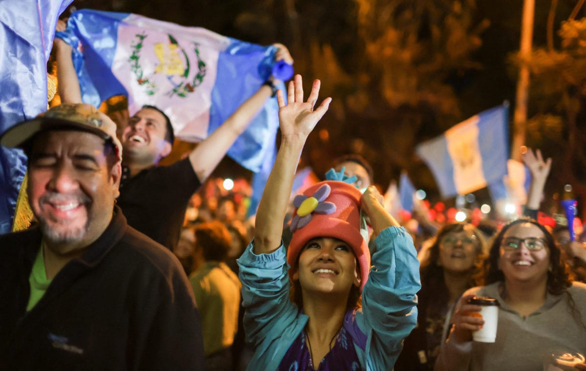 Arévalo’s supporters celebrate his victory in the presidential run-off election. Photo: Pilar Olivares/Reuters