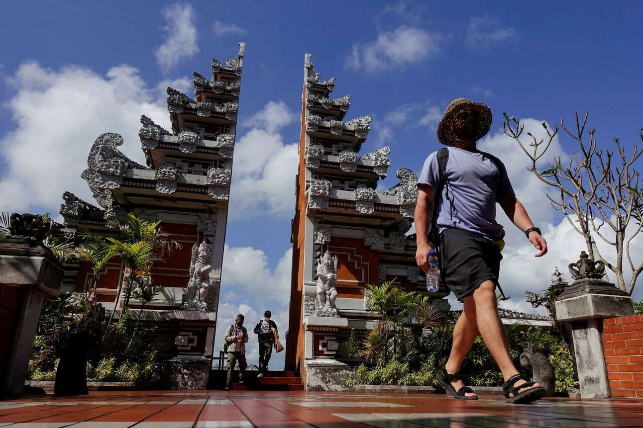 Passengers arrive at the I Gusti Ngurah Rai International Airport in Bali, Indonesia. Photo: Willy Kurniawan/Reuters