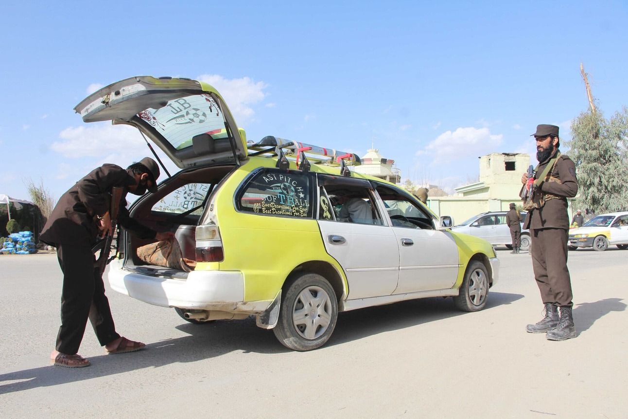 Officials searching vehicles in Kandahar, Afghanistan, following the strikes by Pakistan. Photo: Qudratullah Razwan/EPA