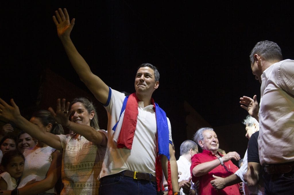 Santiago Peña celebrates his general election victory. Photo: Santi Carneri/Bloomberg