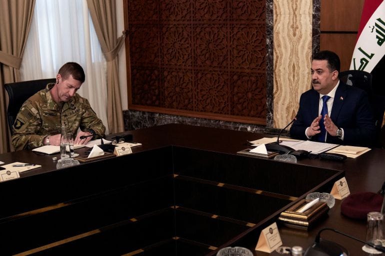 Iraqi Prime Minister Mohammed Shia al-Sudani and Major General Joel ‘JB’ Vowell conducting negotiations between Iraq and the US to wind down the International Coalition mission in Iraq. Photo: Hadi Mizban/Pool via Reuters