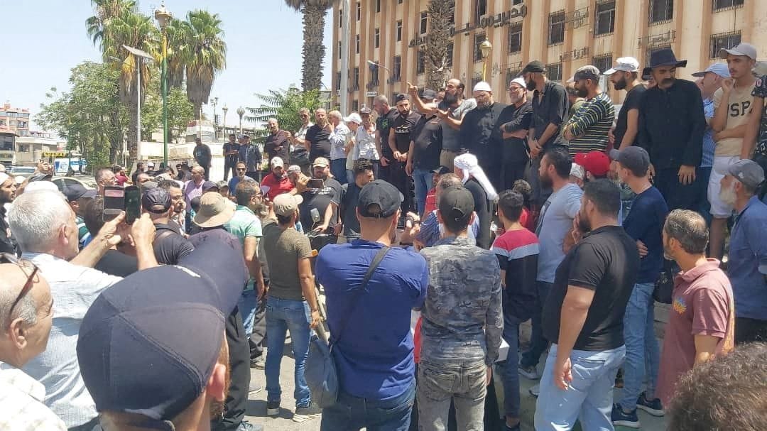 Demonstrators protest against fuel price rises in Syria. Photo: Sweida 24/Handout via Reuters