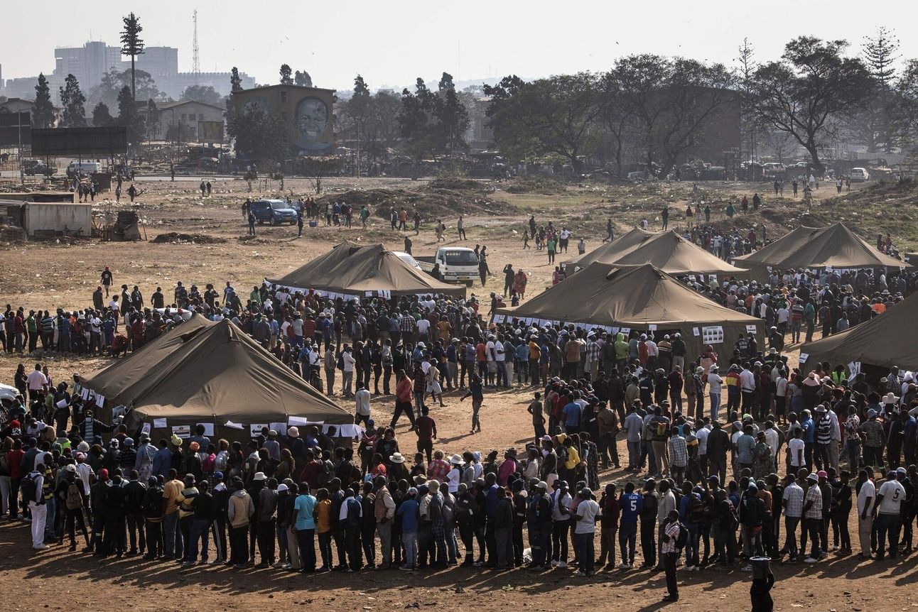 Voters waiting in line in Mbare, outside Zimbabwe’s capital Harare, on Wednesday. Photo: John Wessels/AFP/Getty Images