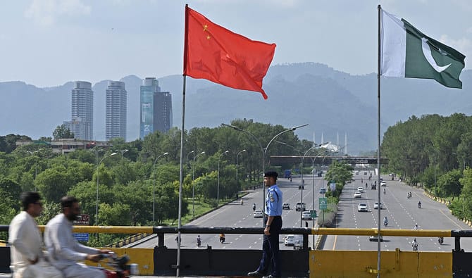 The national flags of China and Pakistan raised to make a visit by Chinese Vice Premier He Lifeng in July 2023. Photo: AFP