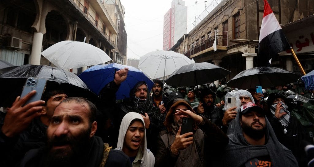 Iraqis protested near the central bank in Baghdad as the currency weakened in early January.&nbsp;Photo:&nbsp;Ahmed Saad/Reuters