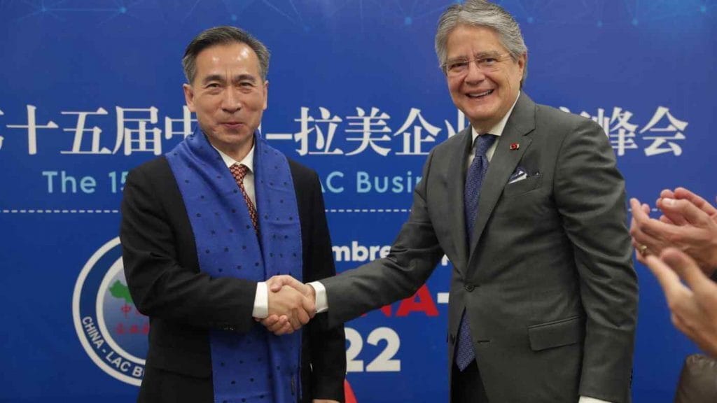 Guillermo Lasso, president of Ecuador, right, inaugurates the 15th China-Latin America and the Caribbean Business Summit in December. Photo: Bolívar Parra