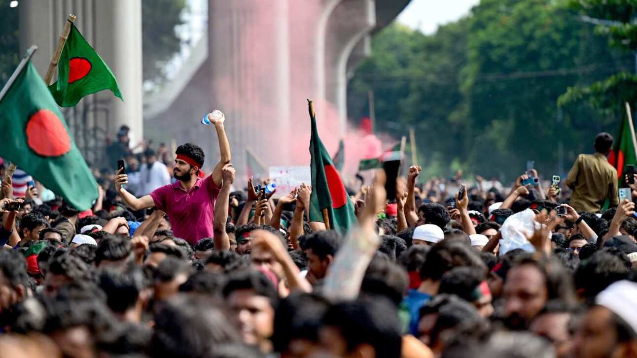 Protesters celebrate Sheikh Hasina’s resignation in Dhaka on Monday. Photo: Munir Uz Zaman/AFP/Getty Images