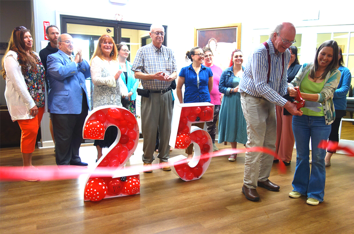 JBC marks 25 years with commemorative ribbon cutting