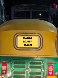 the back of a yellow-green auto; the sign on the back says "Swalpa Adjust Maadi"