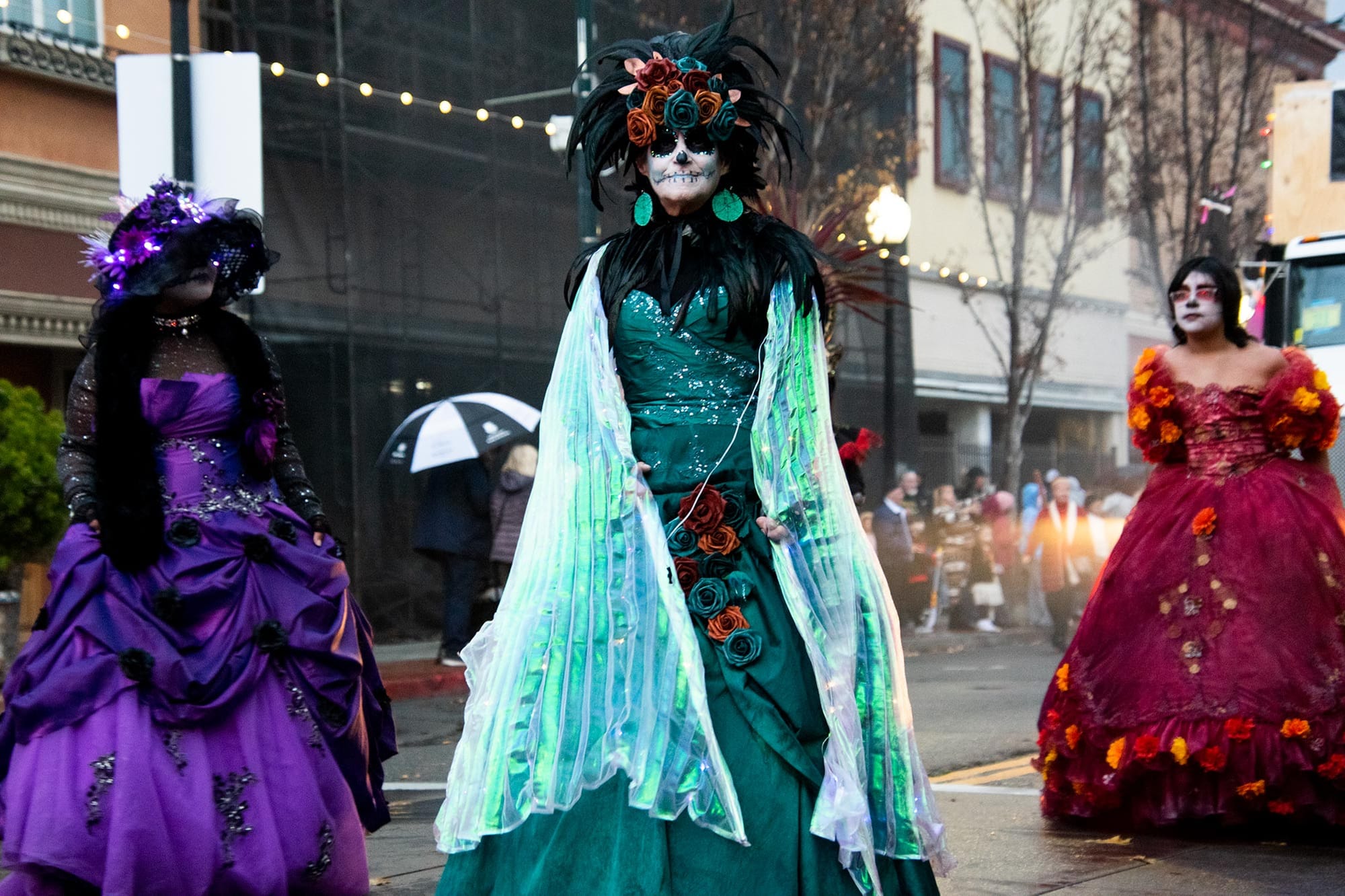 Women dressed as La Catrina marched with the Solano AIDS Coalition in Vallejo's annual Mad Hatter parade.
