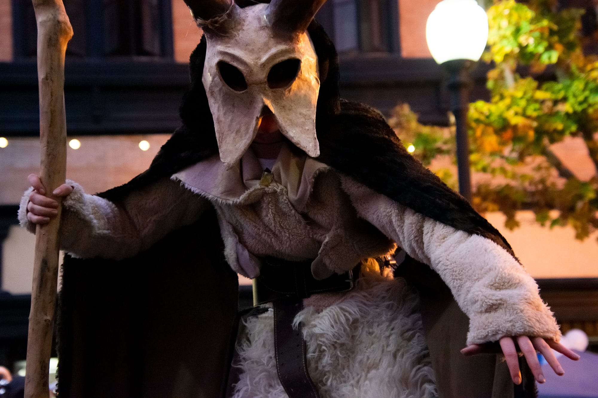A masked character from Vallejo's Mad Hatter parade.