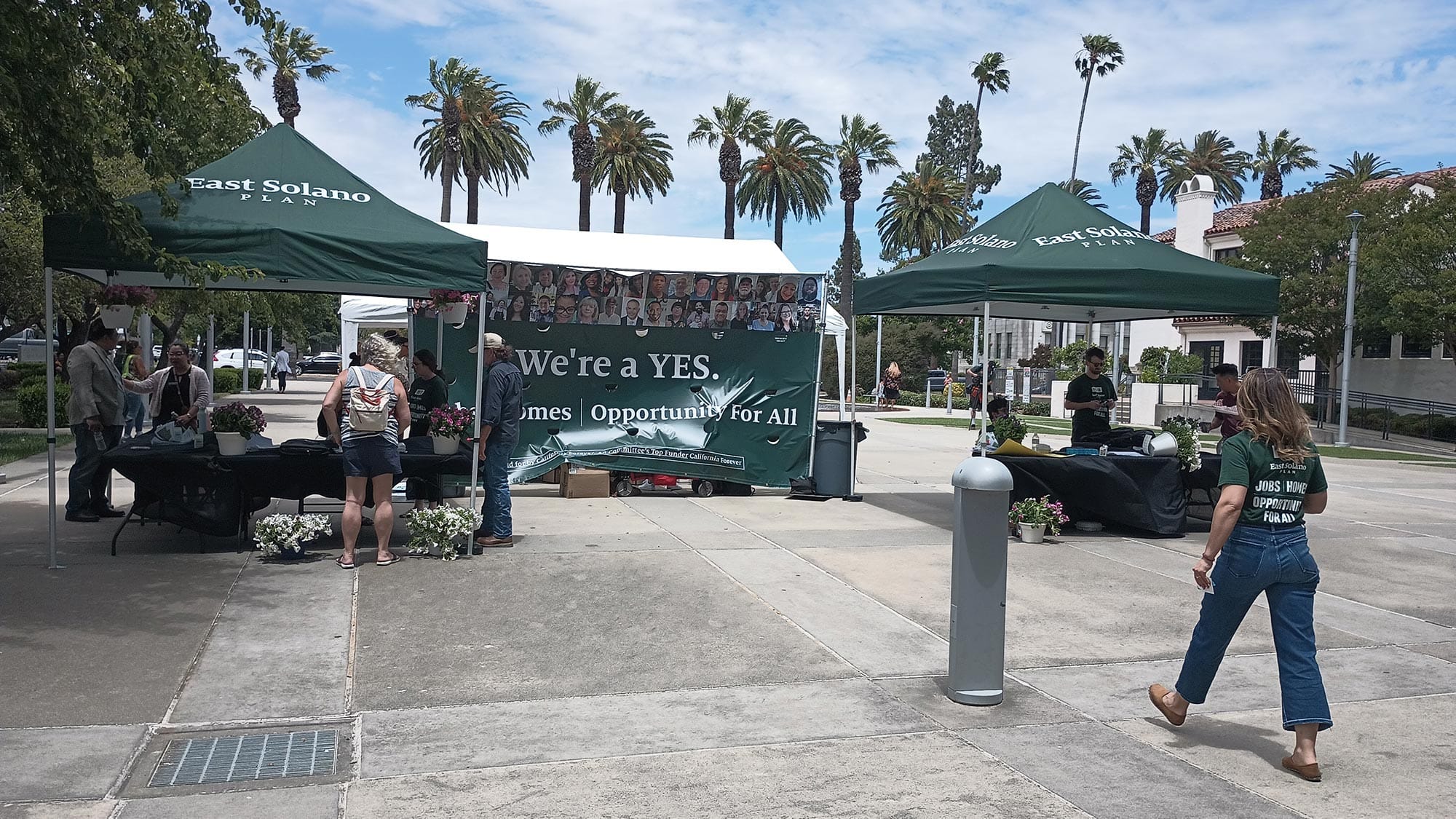 California Forever set up an information booth outside of a Board of Supervisors meeting 