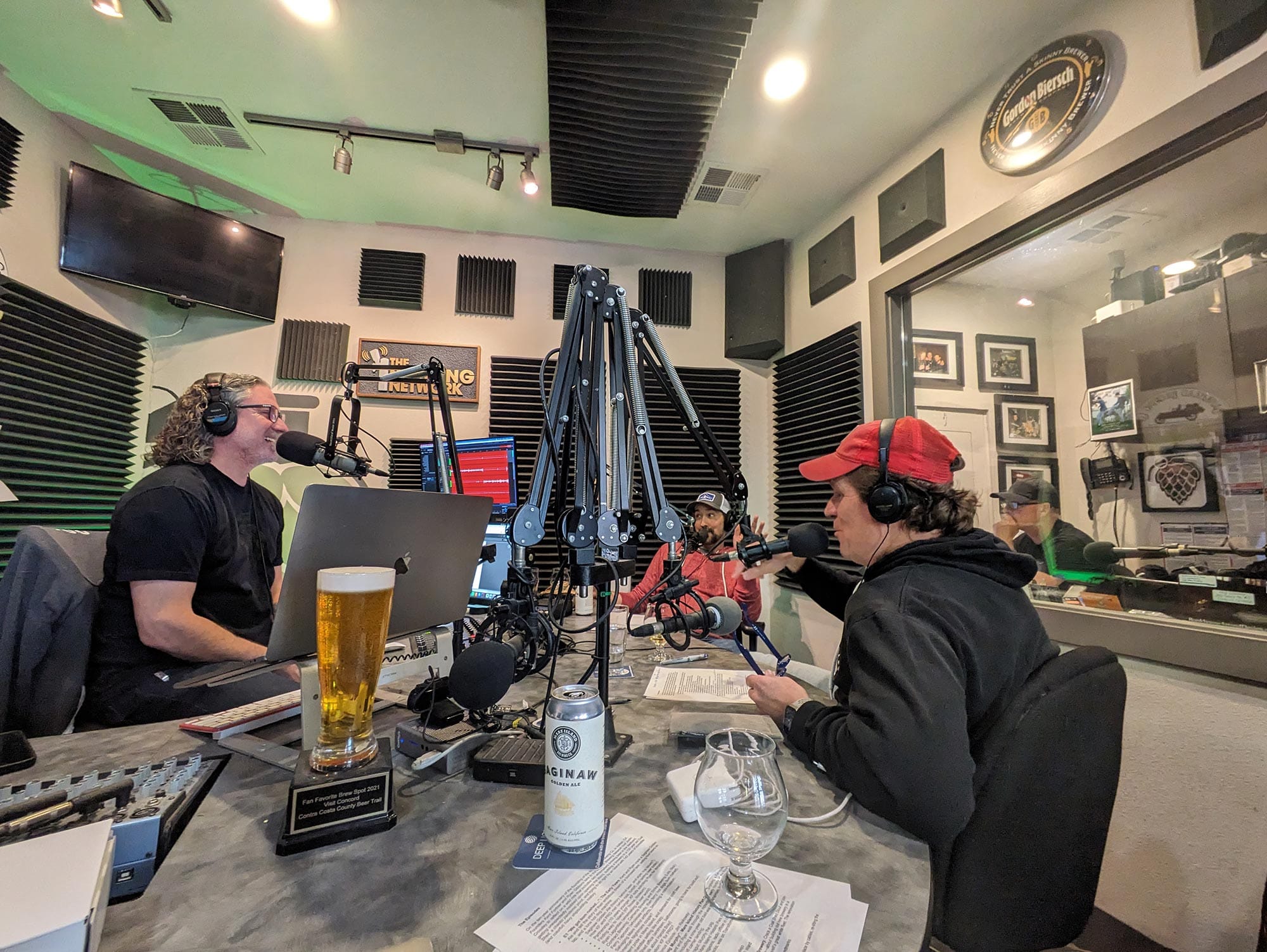 Justin Crossley, left, the founder of The Brewing Network, hosts a podcast with Mare Island Brewing Co. founders Kent Fortner, front right, and Ryan Gibbons, rear. 