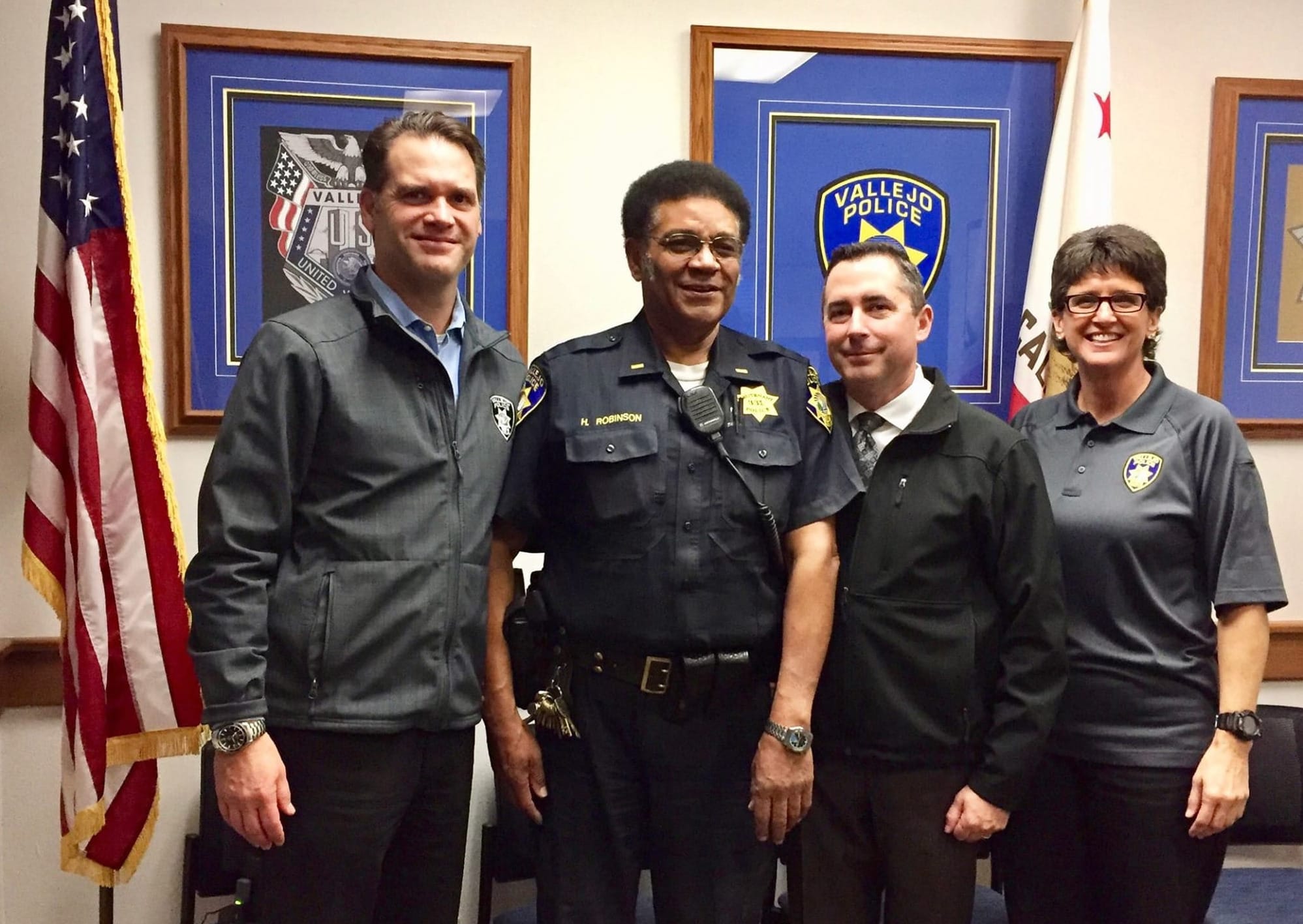 Then-police Chief Andrew Bidou, Lt. Herman Robinson, Capt. John Whitney and Executive Secretary to the Chief Shellyne Darst in 2017.