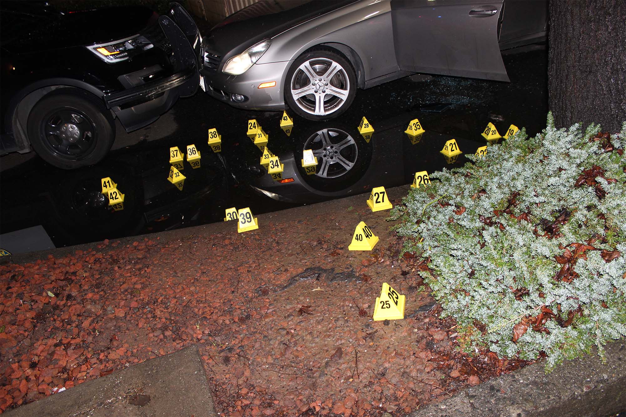 Evidence placards next to Willie McCoy's car after he was shot by Vallejo police in 2019.