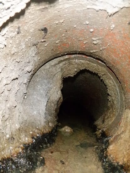 A clay pipe on Mare Island that has experienced an offset joint failure,