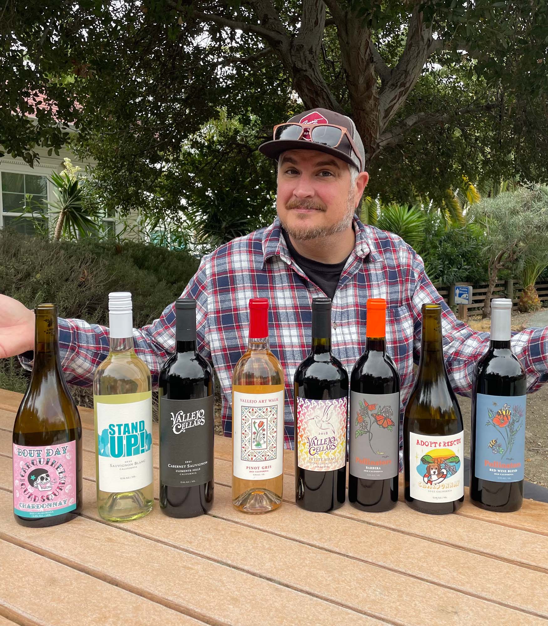 Kevin Jones and several of the wines sold by Vallejo Cellars.