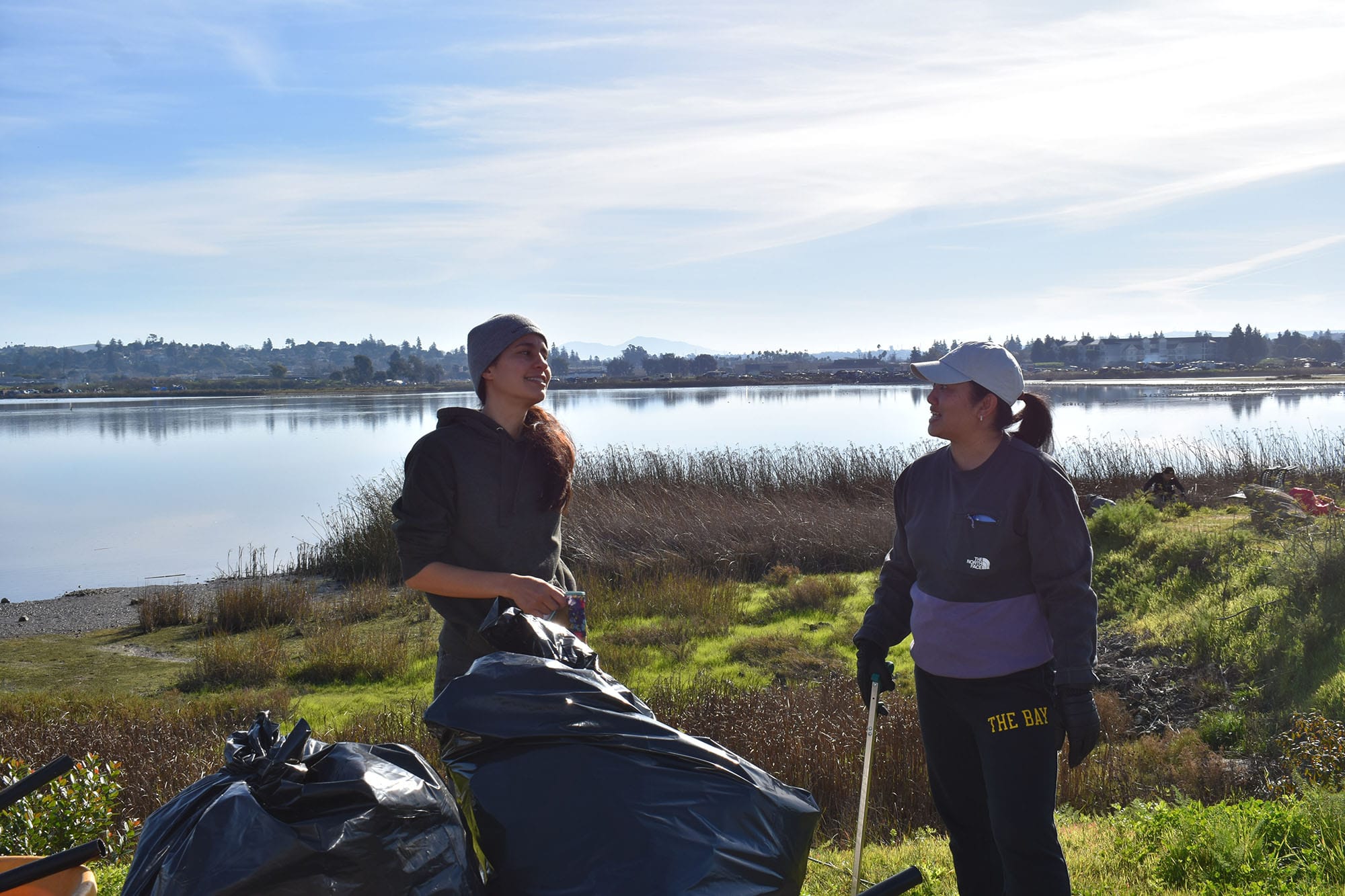 Erin McGarry speaks to a volunteer at Rooted Vallejo's Jan. 11 cleanup event.