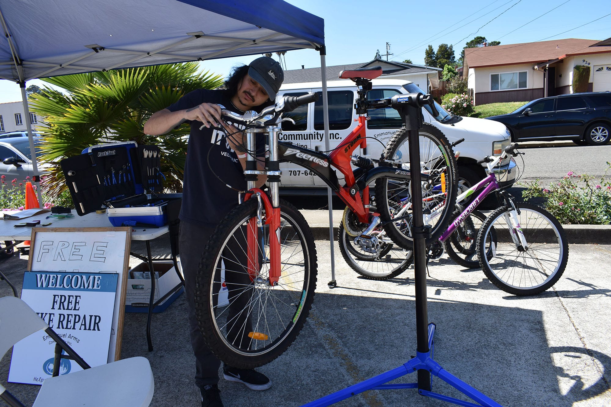Rockville Bike owner Mike Flood fixes a bike