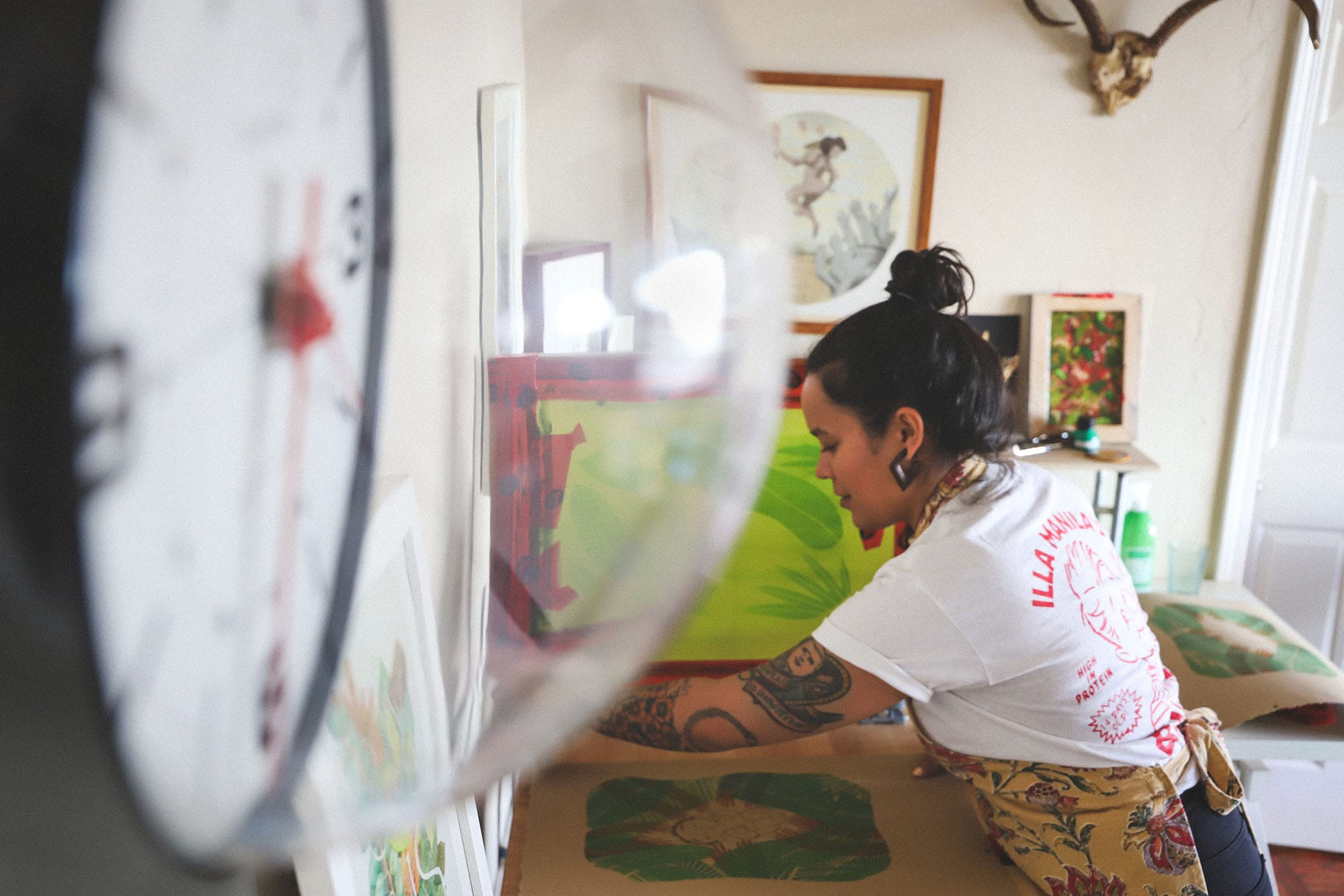 Niki Toney prints an image in her studio.